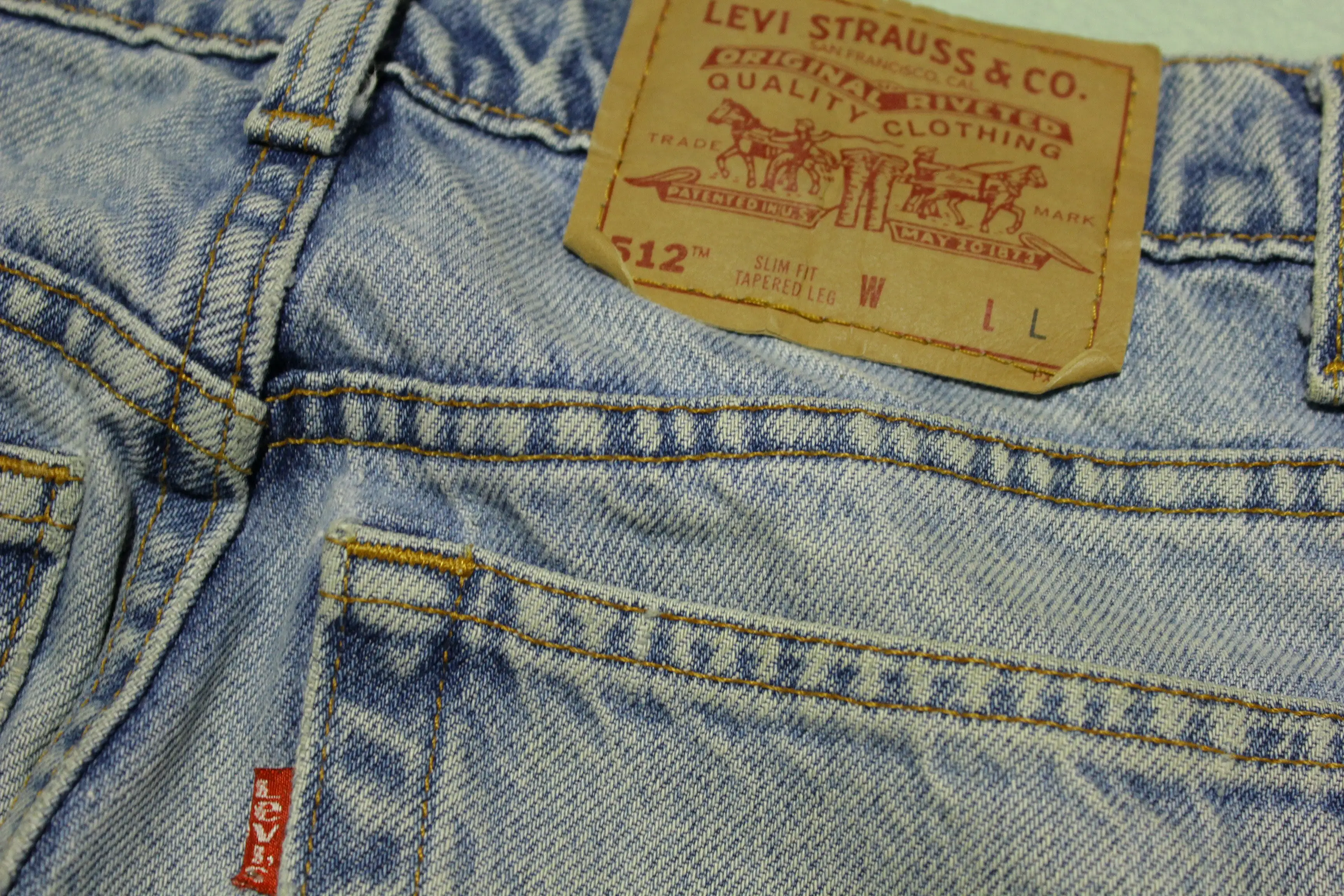 Levis Vintage 90's 512 Tapered Leg Light Washed Distressed Grunge Punk Ripped Jeans